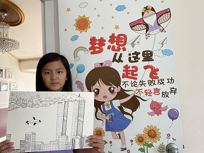 A  Girl Participates in the Exhibition on 9/11 Anniversary